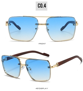 Detail view of square sunglasses with blue gradient lenses and wood grain temples