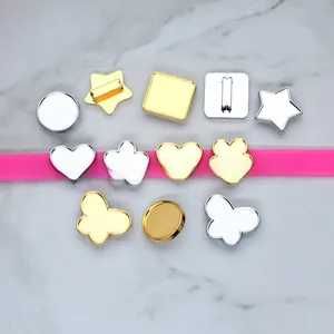 Assorted gold and silver alloy DIY jewelry charms in heart, star, and flower shapes