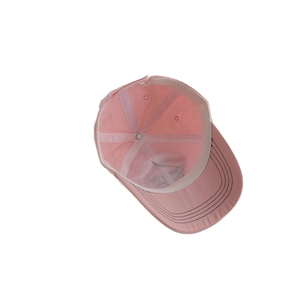 Internal view of pink cotton baseball cap for girls with reinforced seams and stitch detail