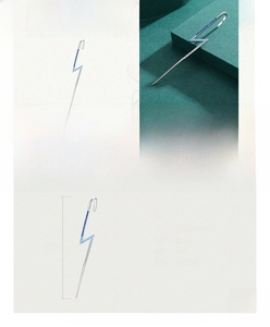 Detailed view of 73.3mm long S925 silver lightning bolt ear cuff with blue zircon stones