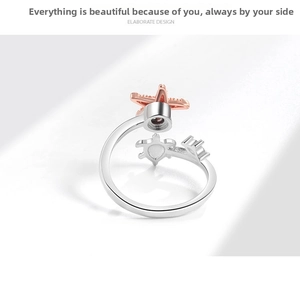 Detailed close-up of a silver turtle and starfish open ring with micro-pave stones