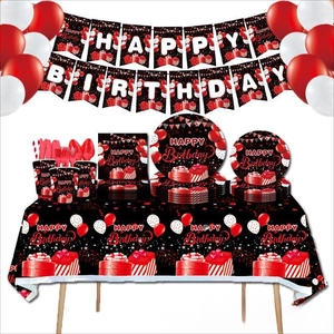 Detail shot of 13th birthday party supplies set with red and black themed tableware items