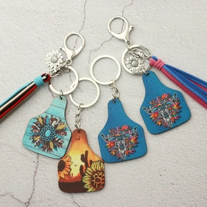 Western cowboy style keychains with cattle tag pendants, tassels and bohemian patterns