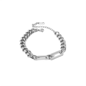 Close-up of industrial style Cuban chain bracelet in silver finish with lobster clasp