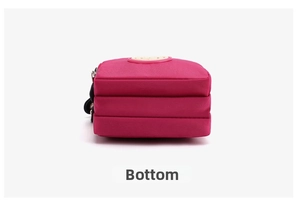 Bottom view of rose red nylon crossbody phone bag showing three-layer storage structure