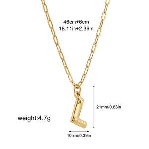 Detail view of gold letter L pendant with dimensions 21x10mm and paperclip chain specs