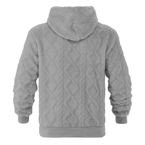 Detail view of grey hooded sweatshirt featuring heavy fleece texture and diamond knit pattern