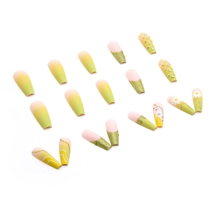 Yellow gradient ballerina press-on nails with daisy floral designs and shiny rhinestones