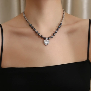 Fashionable titanium steel necklace with dark grey pearls and a zircon heart pendant