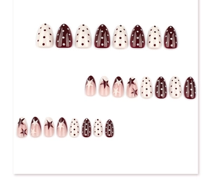 Full set layout of polka dot and star pattern press-on nails in burgundy and cream.