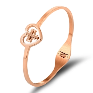 Rose gold stainless steel bangle with hollow heart and sand-blasted cross center