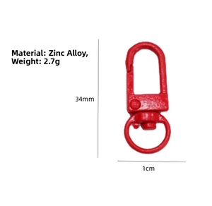 Macro detail of red zinc alloy swivel clasp with dimensions 34mm height and 1cm width