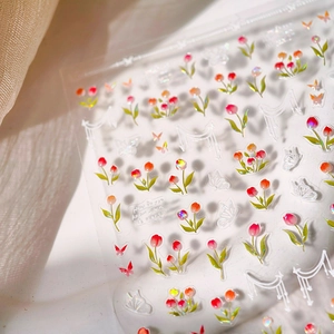 Adhesive tulip nail art stickers with red flowers and white butterfly patterns on soft fabric