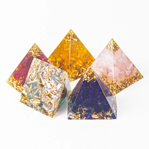 Set of five multi-colored resin pyramids with crushed natural crystals and gold foil