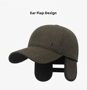 Detail view of winter baseball cap with ear flaps extended in coffee brown wool fabric