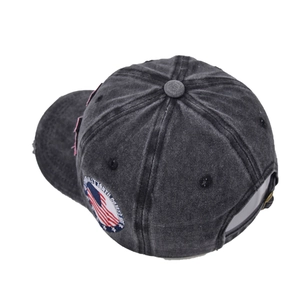 Detail showing vintage washed grey cotton baseball cap with American flag embroidery patch