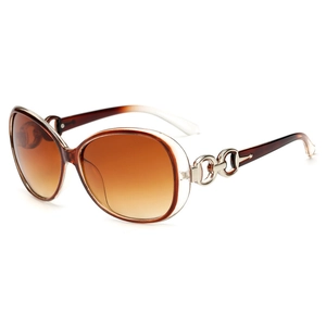 Elegant oversized women's sunglasses with brown gradient lenses and gold hollow temples
