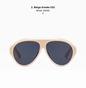 Détail de lunettes pilote oversize beige avec verres gris fumé en coloris C02