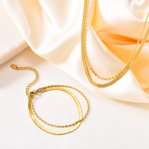 Ensemble collier et bracelet dorés à double couche en maille serpent sur soie