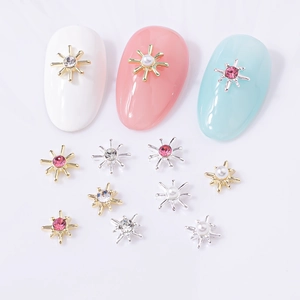 Star-shaped alloy nail charms with rhinestones and pearls in gold and silver plating