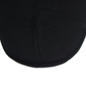 Knitted black frog mushroom beanie hat with warm stitching detail on white background