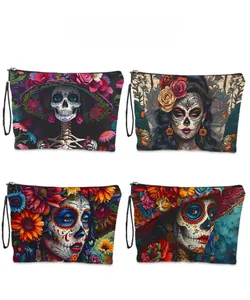 Detail showing four vibrant Dia de los Muertos printed makeup bags with zip closure