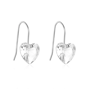 Macro detail of sparkling heart-shaped crystal earrings with polished silver hooks