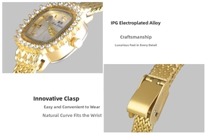 Detail of gold quartz watch featuring diamond-encrusted bezel and innovative folding clasp