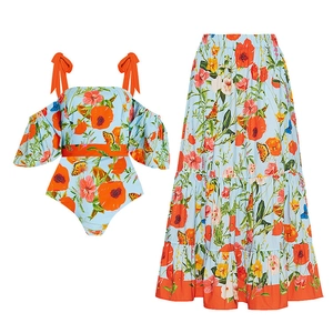 Floral off-shoulder puff sleeve bikini set with high-waisted tiered maxi skirt