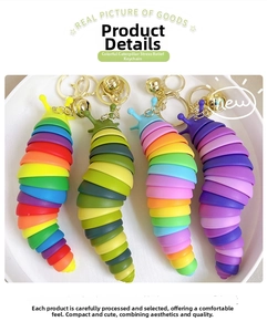 Close-up of colorful caterpillar fidget keychains in four gradients with gold metal clips