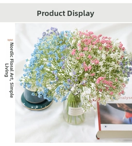 Detail of blue, pink, and white artificial gypsophila bouquets in a Nordic home setting