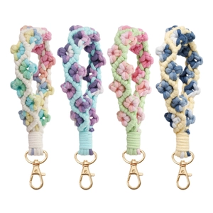 Handmade bohemian floral woven keychains in four colorful macrame patterns with gold clasps