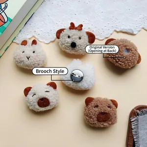 Cute plush animal pins featuring teddy bears and rabbits in warm brown and beige colors