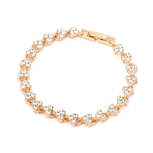 Elegant gold-plated heart chain bracelet with cubic zirconia paving on white background
