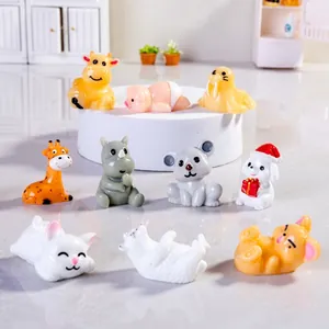 Set of 10 miniature resin animal figurines including cow, pig, and koala for desk decor