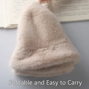 Thick warm faux fur bucket hat for women in beige with a soft plush foldable design