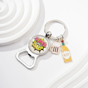 Close-up of metal beer bottle opener keychain with Super Dad and beer charms