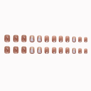 Uñas postizas de Navidad con árboles blancos y estrellas sobre base rosa nude 24 uds