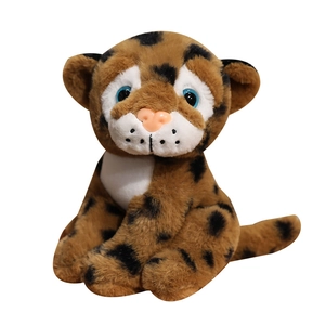 Cute sitting leopard plush toy with blue eyes and leopard spots on white background