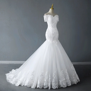 Elegant white off-shoulder mermaid wedding dress with floral lace and tulle skirt