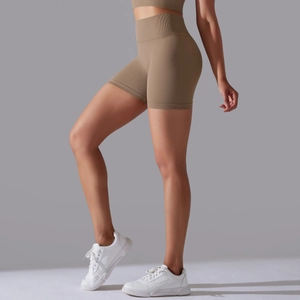Detail of high waist khaki ribbed athletic shorts with body shaping compression fit