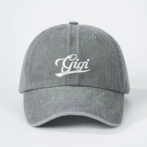 Vintage washed grey denim baseball cap with white Gigi embroidery and adjustable back strap