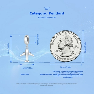 Size scale view of S925 sterling silver airplane pendant next to a coin for reference