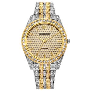 Luxury gold and silver quartz watch featuring a large iced-out diamond dial and metal band