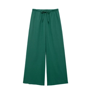 Deep green wide-leg linen pants with elastic drawstring waist on a white background