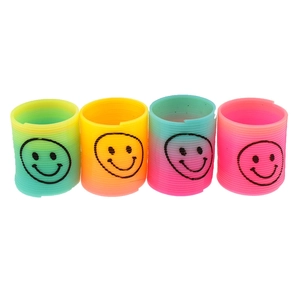 Set of four mini rainbow spring toys with smiley face designs on white background