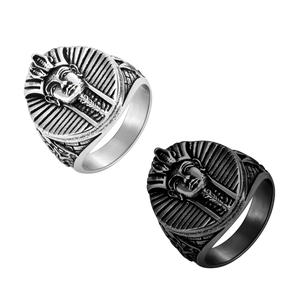 Detail view of Pharaoh head rings in silver and black finishes with Egyptian engraving