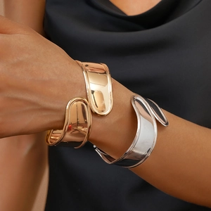 Minimalist irregular crisscross open cuff bracelets in polished gold and silver finishes
