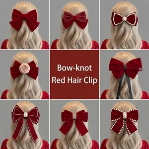 Elegant red bow hair clips set with pearls and camellia flowers for festive hairstyles