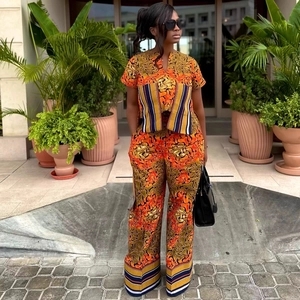 Ethnic print two-piece set featuring V-neck short sleeve top and wide-leg pants for women